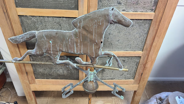 Old copper horse weathervane