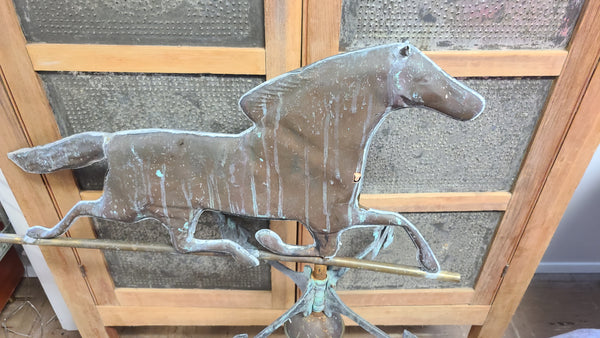 Old copper horse weathervane