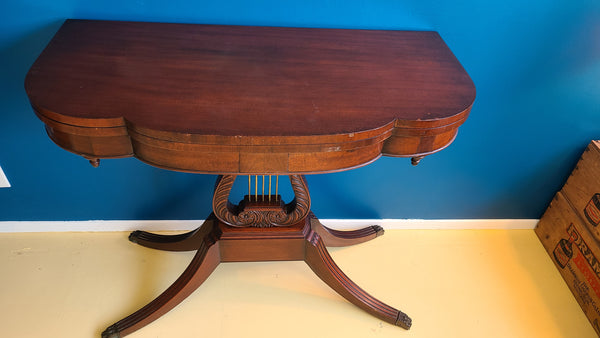 Antique mahogany flip top game table