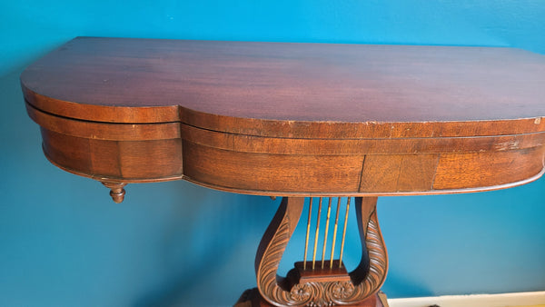 Antique mahogany flip top game table