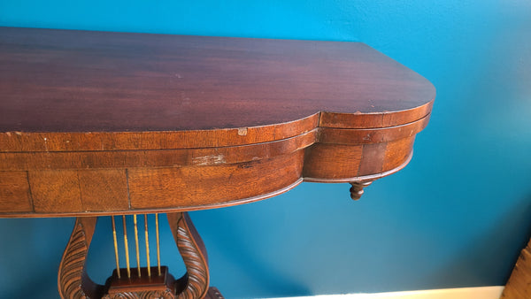 Antique mahogany flip top game table