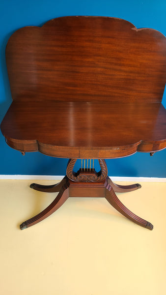 Antique mahogany flip top game table