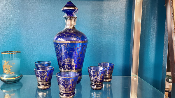 Cobalt blue glass liquor decanter with glasses with silver inlay